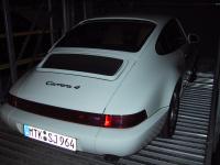 Porsche 911 Typ 964 Carrera 4 - Ansicht hinten rechts (m. Blitz)